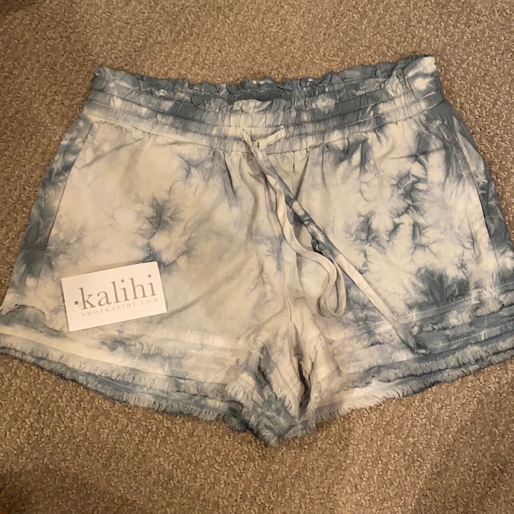 Blue and white TyeDye shorts with Frey hem